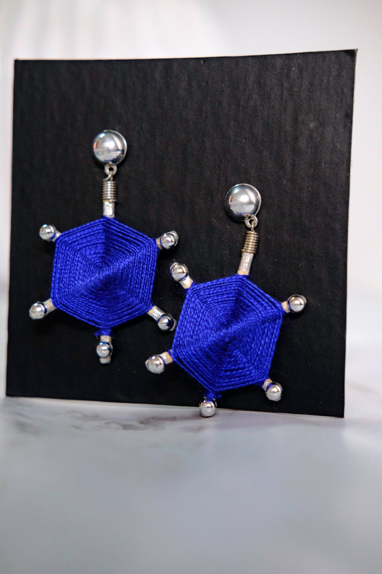 Aretes Joyería Experimental de la Colección ojo de Dios por ANA LOW