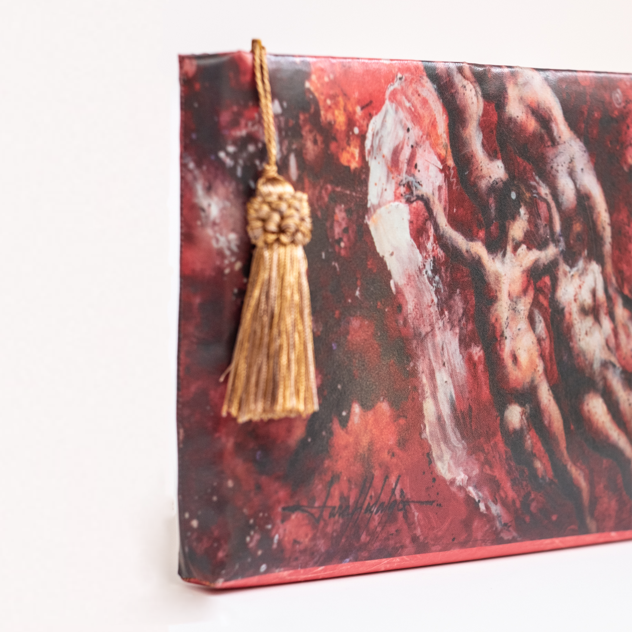 Clutch con arte de Armando Lara, SIGNOS DE ENLACE